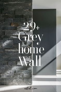 the words 20 + grey home wall are in front of a black brick wall with white lettering