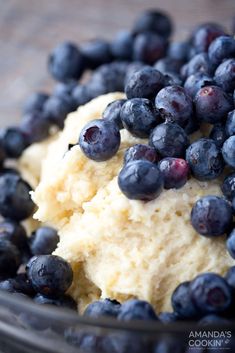 blueberries and mashed potatoes in a glass bowl