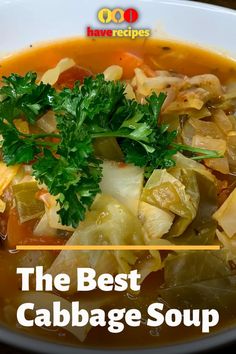 cabbage soup in a white bowl with parsley garnish on top and title the best cabbage soup