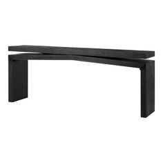 a black wooden bench sitting on top of a white wall