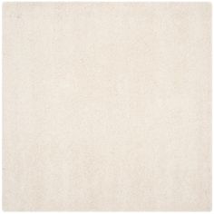 a white rug with some small dots on the bottom and one line in the middle