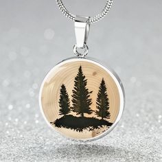 Celebrate her love for nature and family with our Evergreen Pine Tree Necklace, a jewelry gift thoughtfully designed for a mother of three or a Family of 3, mom and 2 kids or mom, dad and one kid, for for a nature lover. This engraved family necklace is perfect for the nature lover or hiking enthusiast, with the option to personalize it by engraving, choose from a charm pendant necklace, bracelet, or keychain. Each piece captures the beauty of the outdoors, making it an ideal gift for her wander Bracelet Keychain, Hiking Nature, Clear Epoxy Resin, Family Of 3, Family Necklace, Love For Nature, Tree Necklace, 2 Kids, Charm Pendant Necklace