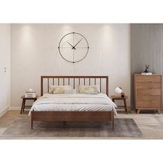 a bed room with a neatly made bed and a large clock on the wall above it