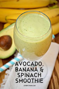 avocado, banana and spinach smoothie in a glass on a table