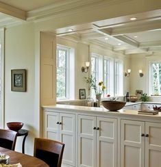 the kitchen is clean and ready to be used as a dining room or living room