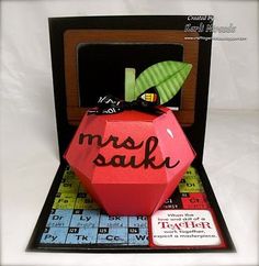 an origami apple with the word mrs sauk on it