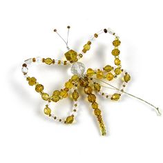 an insect made out of beads and glass beads