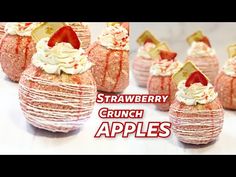 strawberry crunch apples with whipped cream and strawberries in the middle, on top of each other