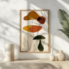 an abstract painting on a white wall above a shelf with vases and plant in the foreground