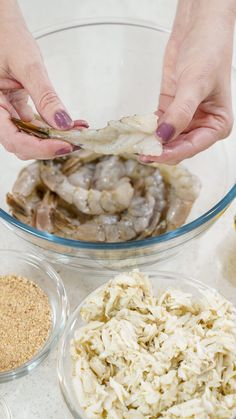 two hands reaching for some food in a bowl