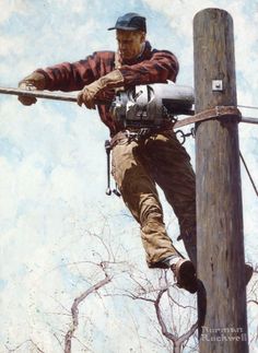 a man climbing up the side of a wooden pole on top of a power line