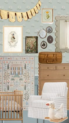 a baby's room is decorated in blue and white with pictures on the wall