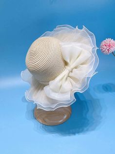 Cute Bendable Beige Straw Hat with Ivory Organza Fabric Overlay and Big Bow for the Spring and Summer seasons. Perfect for Weddings, flower girls, Easter Sundays, Beach, Parties etc. Size: 52 cm Crown- Best fits ages 2 years to 7 years. Make: 100% Paper Shipping & Processing Times For the US: It usually takes 7-10 days to process the order and 5-10 business days for the shipment to arrive. For Canada: 7-10 business to process the order and 7-15 business days for the shipment to arrive. The rest Topi Vintage, Summer Straw Hat, Toddler Girl Summer, Beige Boho, Beach Parties, Wide Brim Sun Hat, Childrens Hats, Christening Dress, Summer Hat