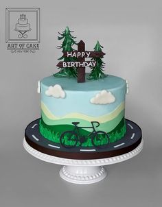 a birthday cake with a bicycle on it