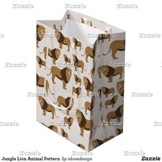 a brown and white shopping bag with lions on the front, sitting against a white background