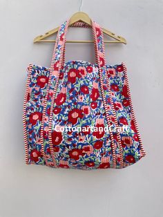 Welcome to CottonartandCraft  Cotton quilted Jhola Bag made by Indian Artisans, this cotton quilted shopping bag is totally unique and multi purpose. Use this for your grocery or as a travel bag. Perfect to suit all. Item :- Cotton Handbag Material: Quilted Cotton Fabric Color - rainbow Pattern: Block Print Style: Tote Bag, Handle Bag, Shoulder Bag Size in Inch:- Height-18" inch Width- 19" inch Handle-13" inch Product Work: Printed & quilted Stitched Usage : Cosmetic, Make-up, Travel, Toiletries Cotton Handbag, Indian Fabric, Kids Items, Sustainable Gifts, Travel Toiletries, Printed Quilt, Rainbow Pattern, Fabric Bag, Printed Bags