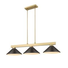 three lights hanging from the ceiling in an industrial style kitchen light fixture with black and gold shades