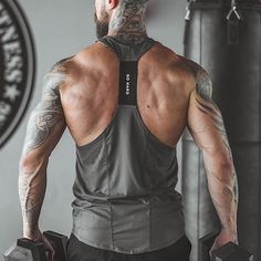 Season:Spring  Summer; Function:Soft,Breathable; Fabric:Polyester; Sleeve Length:Sleeveless; Gender:Men's; Style:Basic,Fashion,Muscle; Elasticity:Micro-elastic; Tops Type:Fitness Tank,Undershirt,Tank,Tank Top; Occasion:Casual Daily,Sport,Gym; Top Length:Regular; Fit Type:Regular Fit; Pattern:Plain; Neckline:U Neck; Front page:FF; Listing Date:02/21/2024; Production mode:External procurement; Bust:; Length [Top]: Gym Dress, Mens Workout Tank Tops, Fitness Studio Training, Fitness Tank Top, Gym Workouts For Men, Hard Men, Gym Tanks, Gym Tank Tops, Mens Workout Clothes