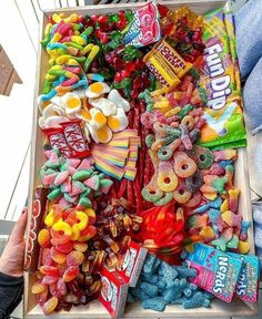 a box filled with lots of different types of candy