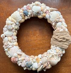 a wreath made out of seashells and rope