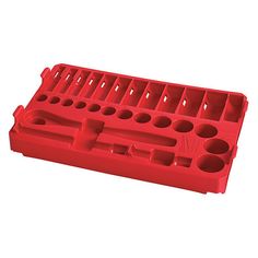 a red plastic tool tray with holes and dividers