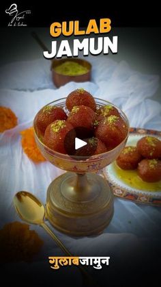 gulab jamun in a glass bowl with spoons on the side and an image of