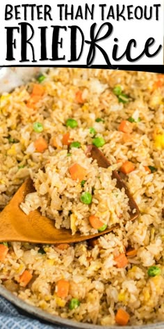 rice with peas and carrots in a skillet on top of a blue towel