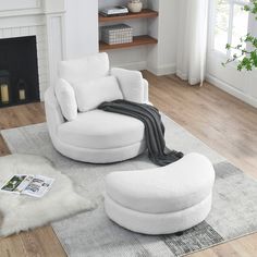 a white chair and ottoman in a living room