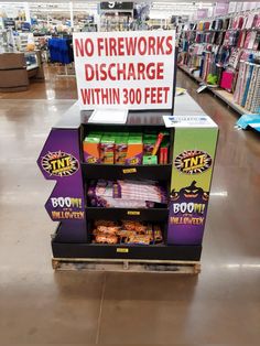 there is a sign that says no fireworks discharge within 300 feet in the store aisle