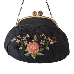 This is a gorgeous embroidery vintage purse. It has black silky material, embroidered with floral sprays in pink, blue, and green. It has a kiss-lock clasp with a tan satin interior and a chain handle. There are a couple places where the satin has torn, commensurate with age. Please look at the pictures carefully, as they are an important part of the description, show the age, wear and includes measurements. If you have questions or concerns feel free to send a message and I will respond as soon as I can. Thanks for looking! Condition: Pre-Owned Good Vines And Flowers, Clasp Purse, Embroidered Rose, Embroidery Vintage, Rose Vines, Purse Vintage, Floral Spray, Christmas Deals, Vintage Purse