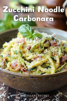 a bowl filled with zucchini noodle carbonara