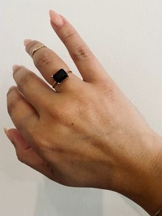 A simple & understated statement piece. This ring is so easy to wear while really adding a subtle punch to your jewelry stack. Currently Available // 14kt yellow gold, size 8 Product Description // Featuring a 9x7mm emerald cut Onyx on a 1.2mm band Available in 14kt yellow gold, white gold, & rose gold with a two week production time if not in the "Ready To Ship" tab and matching currently available above. Email makeityours@laneandkate.com for requests w custom sizing & gemstones available. Vale Jewelry, Jewelry Stack, Stacked Jewelry, Onyx Ring, Ring Ideas, East West, Boutique Jewelry, Emerald Cut, Gold Rose