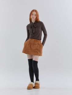 Editor's NotesCasual mini skirt that made ofcorduroy fabric. Featuring the pin tuck detail that creates voluminous silhouette,and versatile stylings are available with the minimal design. Style withsweatshirts, sweater, or cardigans to complete the looks. - Belt loops- Zip-fly- Pin tuck detail- Mini length- Corduroy fabric made Measurements(in.)ONE SIZE (XS-M)- Total length: 14.17 in- Waist: 11.02 in ~ 14.56 in- Hem: 20.66 in*Model info: Height 5’ 6.7”*The actual product measurementsma Fall Casual Corduroy Skort, Casual Corduroy Skort For Fall, Corduroy Mini Skort For Fall, Fall Mini Corduroy Skort, Fitted Corduroy Mini Skirt For Winter, Casual Corduroy Mini Skirt For Winter, Winter Cotton Pleated Mini Skirt, Chic Winter Cotton Mini Skirt, Cotton Pleated Mini Skirt For Winter