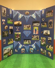 a wall display with photos and pennants for sports teams on it's sides