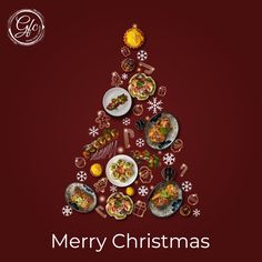 a christmas tree made out of plates with food on them and the words merry christmas