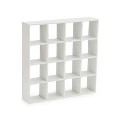 a white book shelf with eight cubes on each side