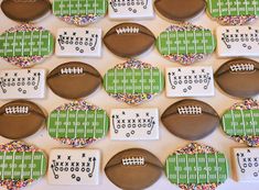 decorated cookies with footballs and numbers on them