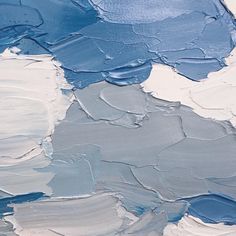 an abstract painting with blue and white colors