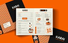 an orange and black brochure with the words kaba on it, next to two