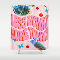 a pink shower curtain with the words less honk more town on it and an image of