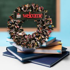 a wreath made out of books sitting on top of each other