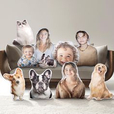 a group of dogs and cats sitting on top of a couch next to each other