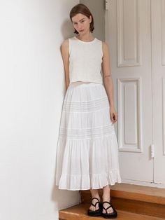 This is a feminine and unique skirt by JMARK New York that is made out of high quality and sturdy fabric. With trendy design detail and refined romantic mood, you can style it for your daily casual outfit.- Voluminous shirring detail- Feminine and unique mood- Elastic waistband and lace detail Feminine White Maxi Skirt For Summer, Elegant Ruffled Maxi Skirt For Day Out, Feminine Pleated Maxi Skirt, Feminine White Maxi Skirt With Ruffles, Feminine White Ruffled Maxi Skirt, Chic Gathered Maxi Skirt For Day Out, Elegant Cotton Maxi Skirt For Spring, Feminine Cotton Skirt With Ruffle Hem, Feminine Gathered Maxi Skirt For Summer