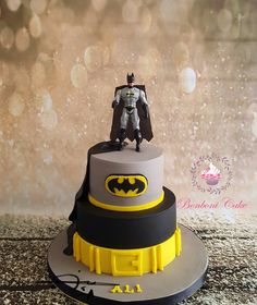 a batman themed cake on top of a table