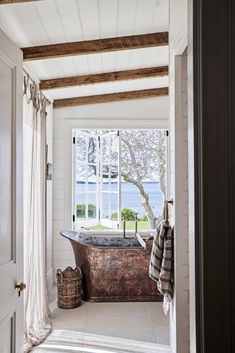 The gentle renovation of this 19th-century cottage in St Helens, Tas, revealed layers in time. Tap the link now to take a full tour. Copper Soaker Tub, Cottage Bathroom Inspiration, Beams Ceiling, Bathroom Inspiration Board, Country Bathrooms, Country Style Bathrooms, Cottage Bath, The Black Swan, Outdoor Tub