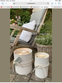 two white buckets sitting next to each other in front of a wooden chair and wicker basket