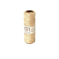 a spool of thread on a white background