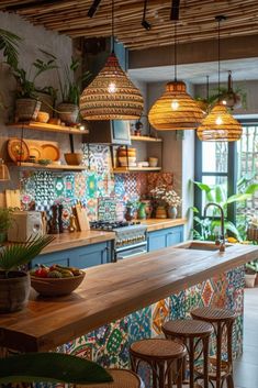 a bar with stools and hanging lights in a room filled with potted plants