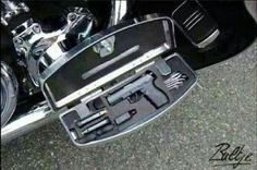 an open case on the back of a motorcycle