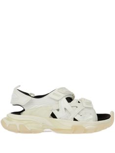 white/black branded insole debossed logo to the front branded insole branded heel counter open toe front touch-strap fastening chunky rubber sole White Balenciaga, Debossed Logo, Balenciaga Track, Sandals White, Versace Outfit, Chunky Sandals, Balenciaga Shoes, Iconic Bags, Flat Boots